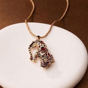 Gold Leopard Pendant Necklace with Red Accents